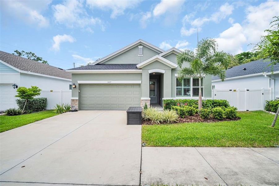 Front exterior of a new home in , Palm Harbor, FL, highlighting curb appeal (Image 2).