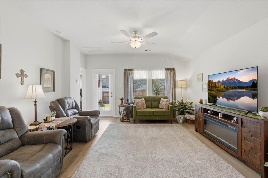 The light and bright living room creates a comfortable and cozy space to relax in.