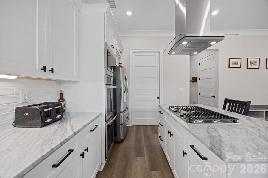 Furnished interior view inside a new home in , Belmont (Image 6).
