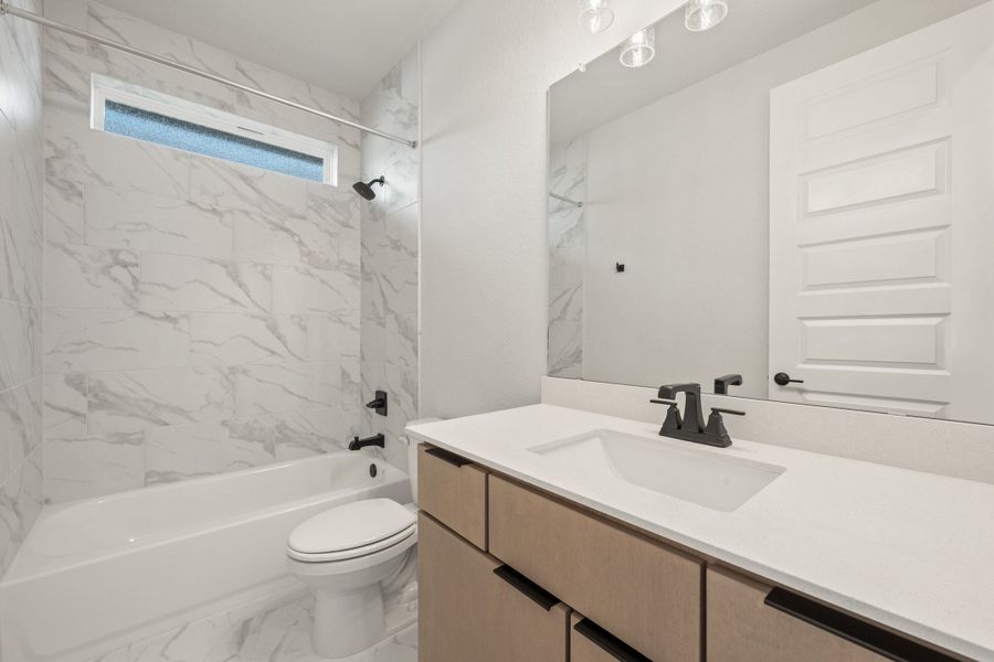 Furnished interior view inside a new home in Lagos Reserve, Manor (Image 15).