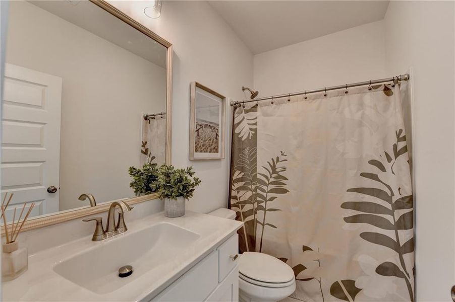 Furnished interior view inside a new home in Long Hollow Landing, Gainesville (Image 8).