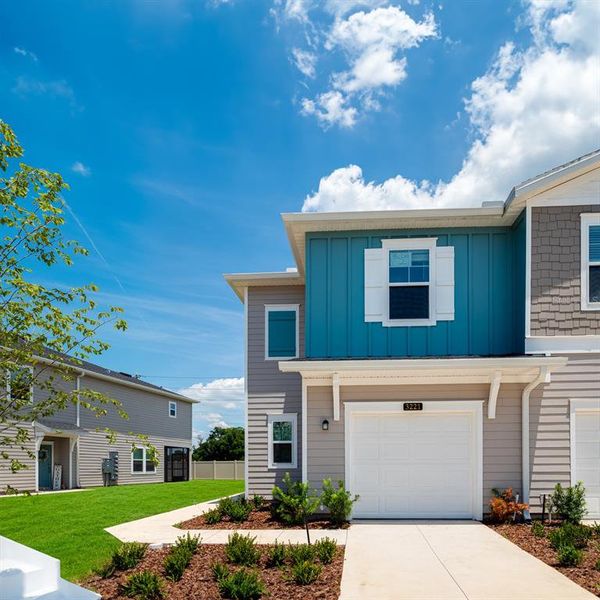 Front exterior of a new home in , Ocala, FL, highlighting curb appeal (Image 1). Front exterior of a new home in , Ocala, FL, highlighting curb appeal (Image 1).