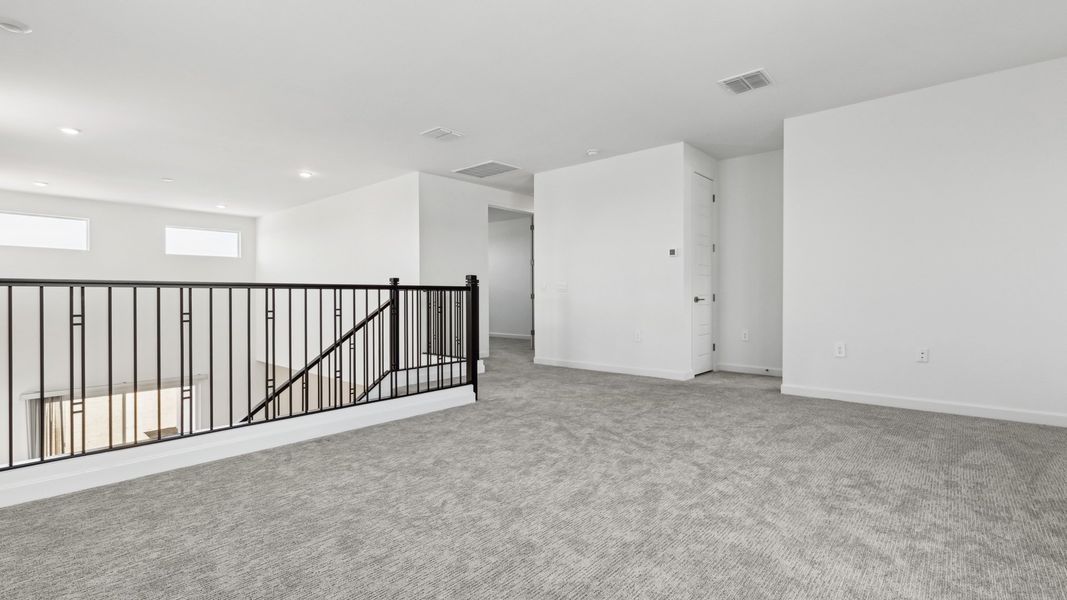 Representative unfurnished interior of a home built from the Phoenician by D.R. Horton in The Ridge at Stone Butte, Phoenix (Image 29). Representative unfurnished interior of a home built from the Phoenician by D.R. Horton in The Ridge at Stone Butte, Phoenix (Image 29).