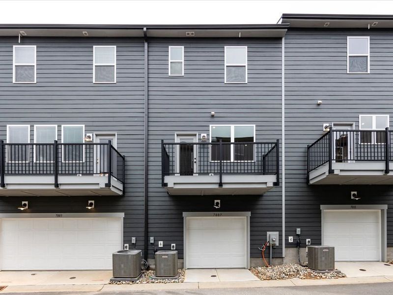 Front exterior of a new home in Context at Oakhurst, Charlotte, NC, highlighting curb appeal (Image 29). Front exterior of a new home in Context at Oakhurst, Charlotte, NC, highlighting curb appeal (Image 29).