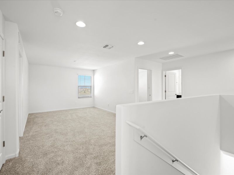Spacious, unfurnished interior of a new home in Las Patrias at Star Valley Phase III - Premier Series, Tucson (Image 11).