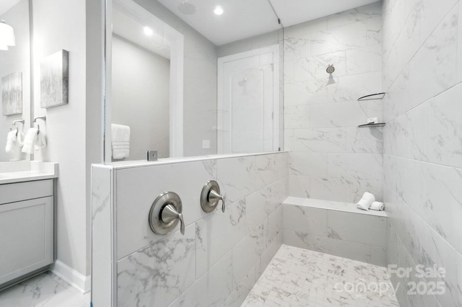 Spa Shower features both wall and rain shower heads Spa Shower features both wall and rain shower heads