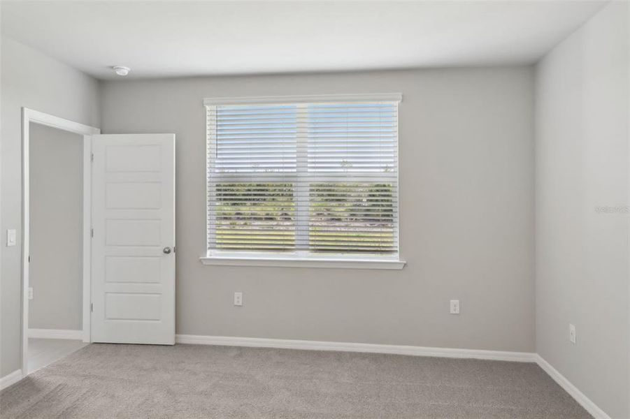 Spacious, unfurnished interior of a new home in Crescent Lakes - Premier Series, Punta Gorda (Image 14). Spacious, unfurnished interior of a new home in Crescent Lakes - Premier Series, Punta Gorda (Image 14).