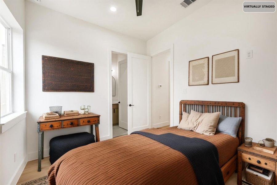 Virtually staged secondary bedroom.