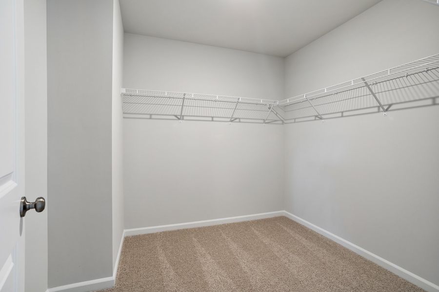 Spacious, unfurnished interior of a new home in Cambridge Reserve, Angier (Image 28).