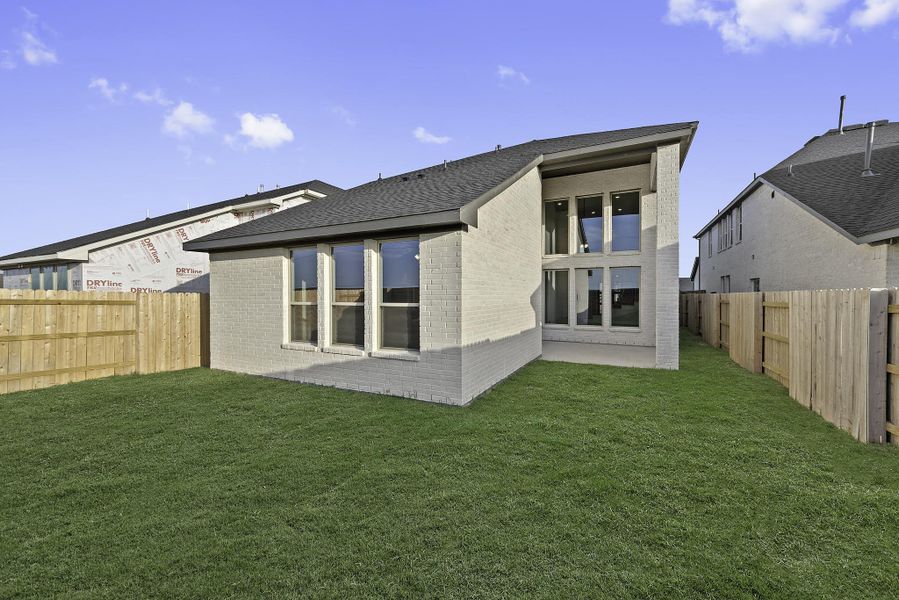 Exterior details and patio area of a home in Elyson, Katy (Image 3). Exterior details and patio area of a home in Elyson, Katy (Image 3).