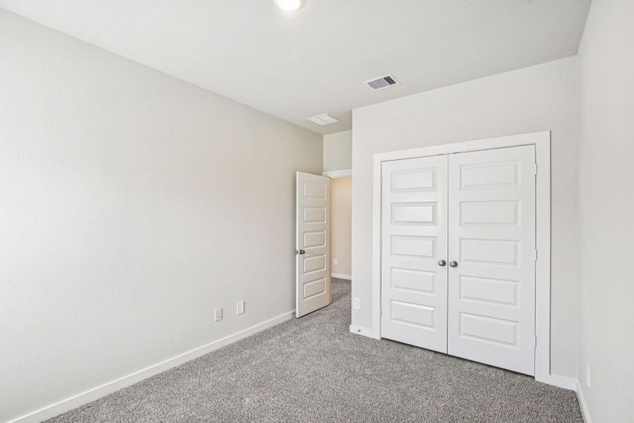 Spacious, unfurnished interior of a new home in Spring Brook Village - City Series, Houston (Image 19). Spacious, unfurnished interior of a new home in Spring Brook Village - City Series, Houston (Image 19).