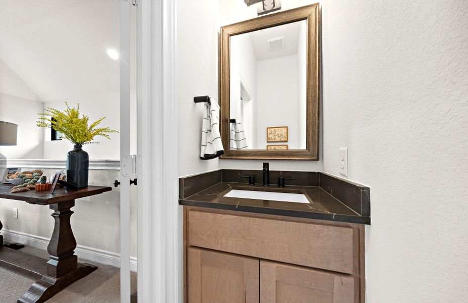 Furnished interior view inside a new home in Bridgeland 60′, Cypress (Image 23).