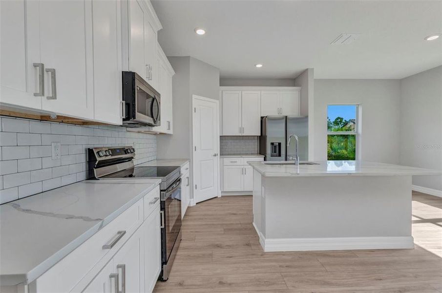 Furnished interior view inside a new home in , Rotonda West (Image 14). Furnished interior view inside a new home in , Rotonda West (Image 14).