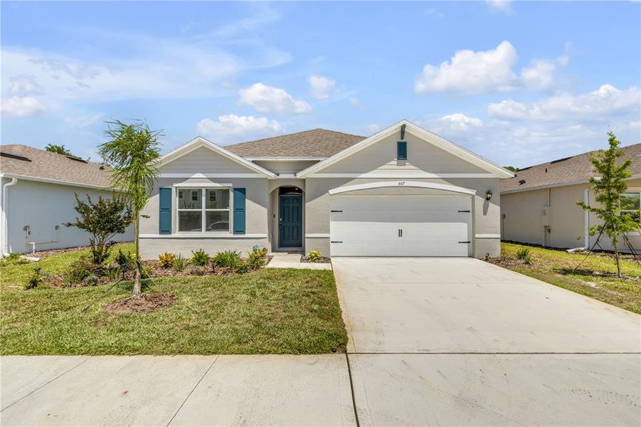 Front exterior of a new home in , New Smyrna Beach, FL, highlighting curb appeal (Image 30).