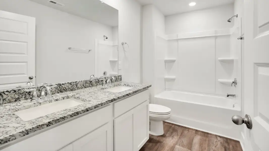 Furnished interior view inside a new home in Saltgrass Landing, Winnabow (Image 13).