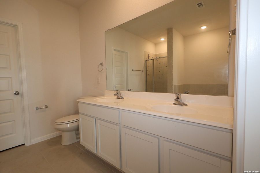 Furnished interior view inside a new home in Verano Farms, Von Ormy (Image 13).