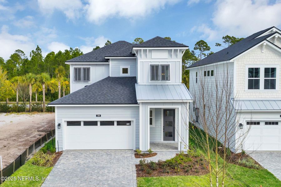 Front exterior of a new home in , Ponte Vedra, FL, highlighting curb appeal (Image 24).