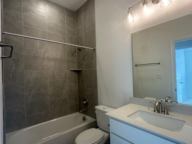 Bathroom with vanity and shower / bath combination Bathroom with vanity and shower / bath combination