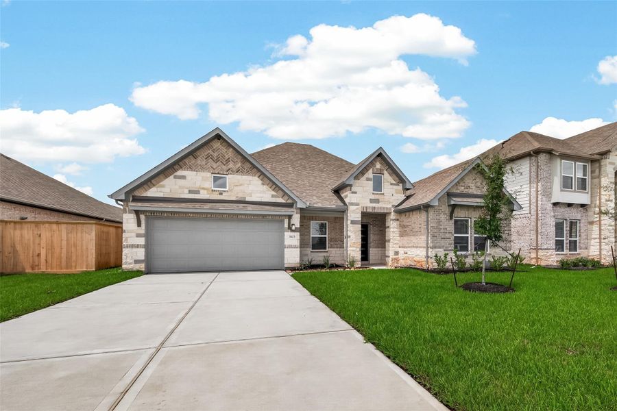 Front exterior of a new home in Foxtail Palms, Manvel, TX, highlighting curb appeal (Image 25). Front exterior of a new home in Foxtail Palms, Manvel, TX, highlighting curb appeal (Image 25).