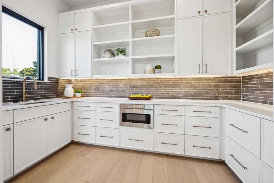 Ample storage in the kitchen with spacious butlers pantry. Ample storage in the kitchen with spacious butlers pantry.