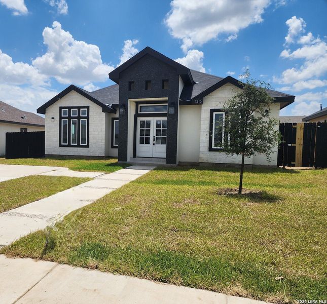 Front exterior of a new home in , Eagle Pass, TX, highlighting curb appeal (Image 21). Front exterior of a new home in , Eagle Pass, TX, highlighting curb appeal (Image 21).