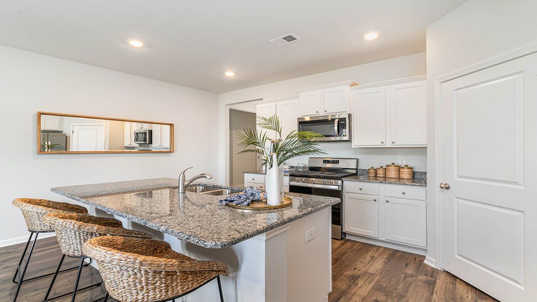 Representative furnished interior of a home built from the CALI by D.R. Horton in Harper Meadows, Loris (Image 9).