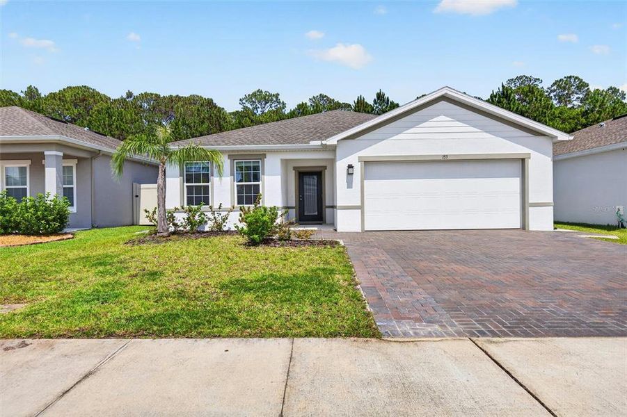 Front exterior of a new home in , Daytona Beach, FL, highlighting curb appeal (Image 2). Front exterior of a new home in , Daytona Beach, FL, highlighting curb appeal (Image 2).