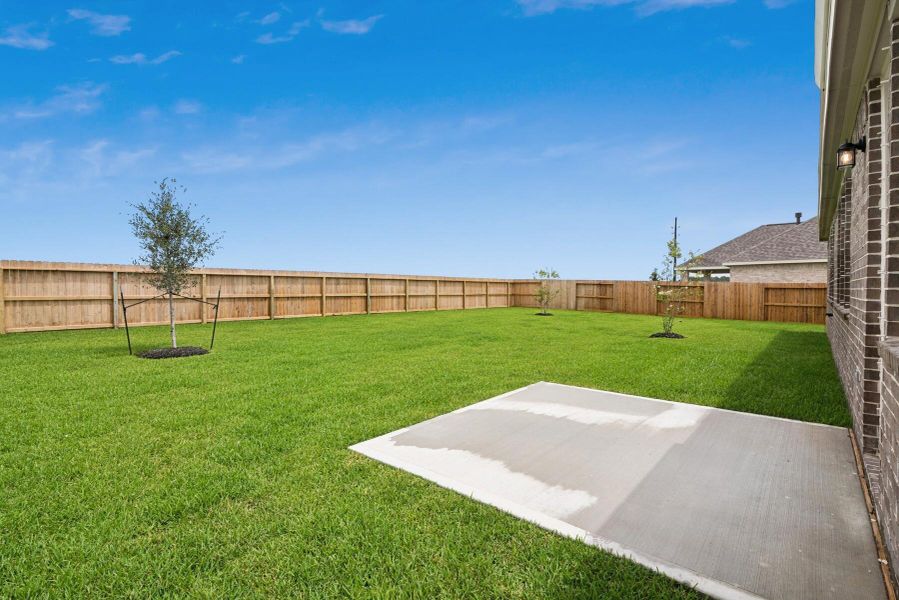 Spacious backyard with patio Spacious backyard with patio