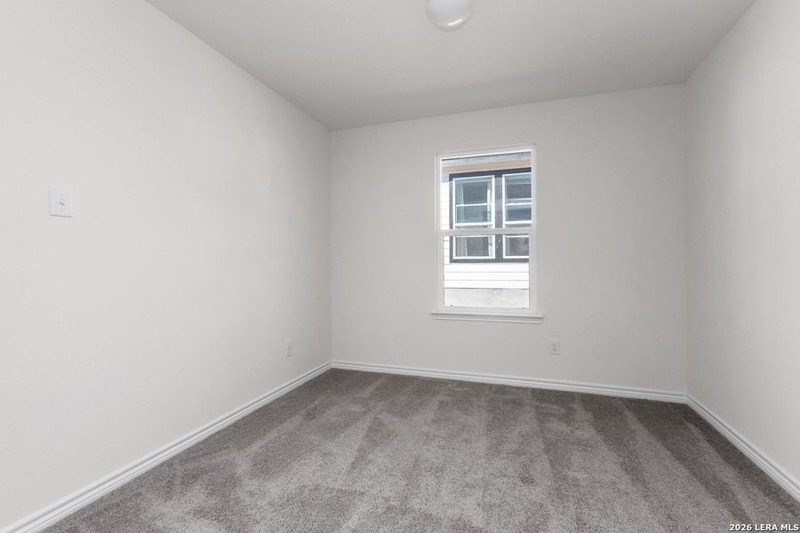 Spacious, unfurnished interior of a new home in Hidden Bluffs at TRP, San Antonio (Image 10).
