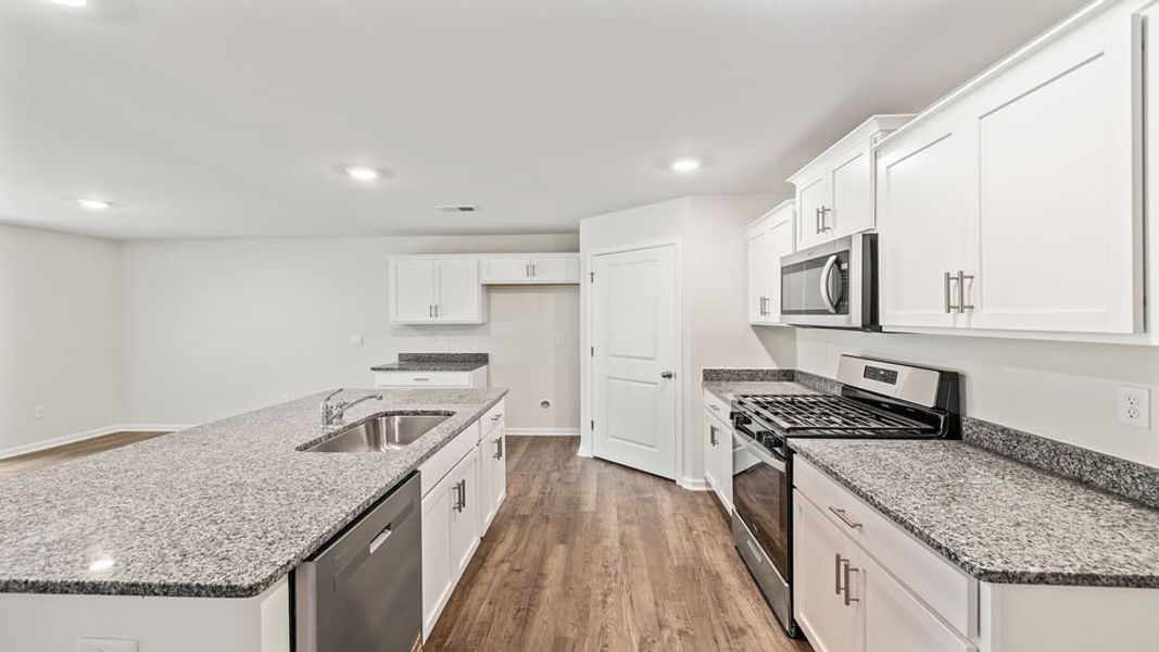 Furnished interior view inside a new home in Harrier Point, Woodruff (Image 6).