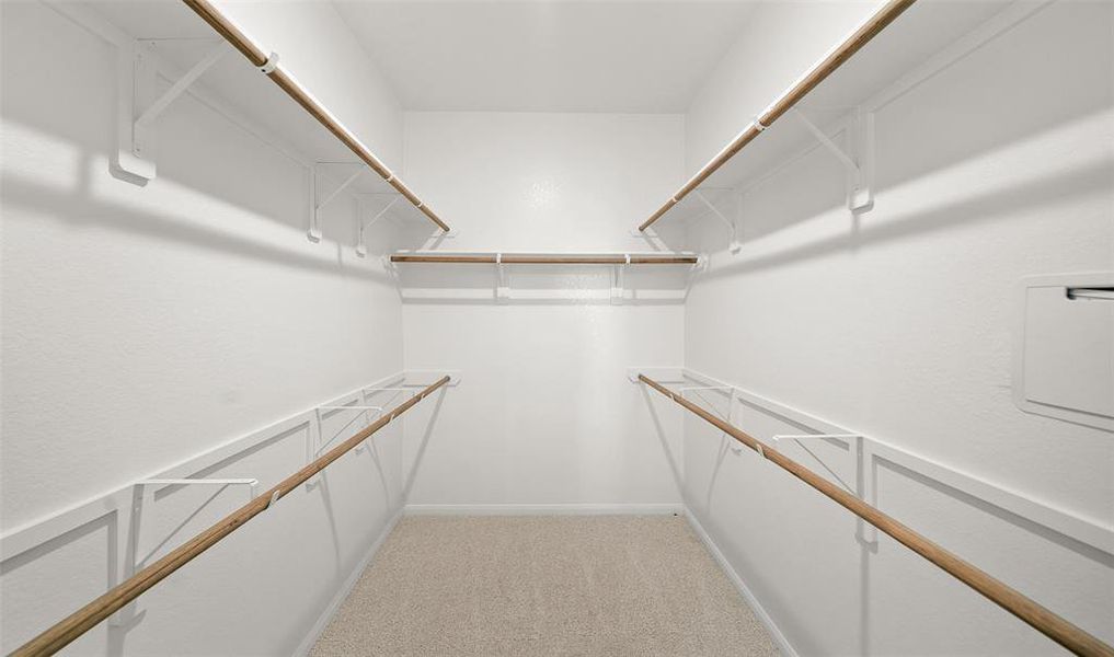 Walk-in closet in owner's suite (*Photo not of actual home and used for illustration purposes only.)