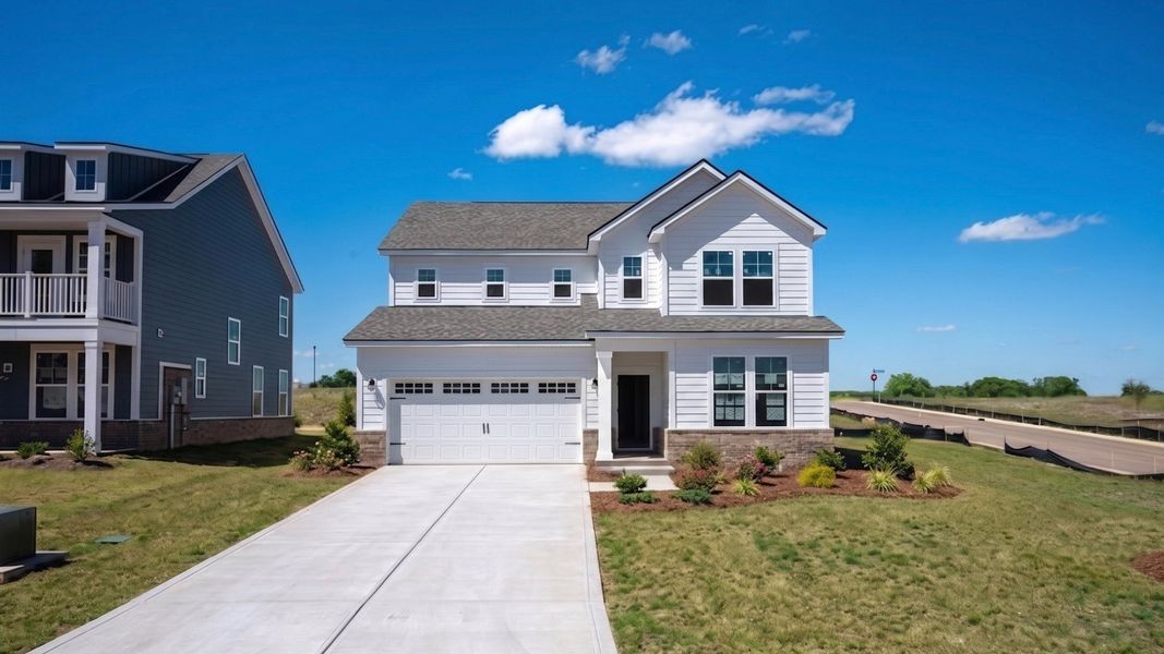 Exterior of a Wynwood plan home built at McClure Farms in Columbia, TN Exterior of a Wynwood plan home built at McClure Farms in Columbia, TN
