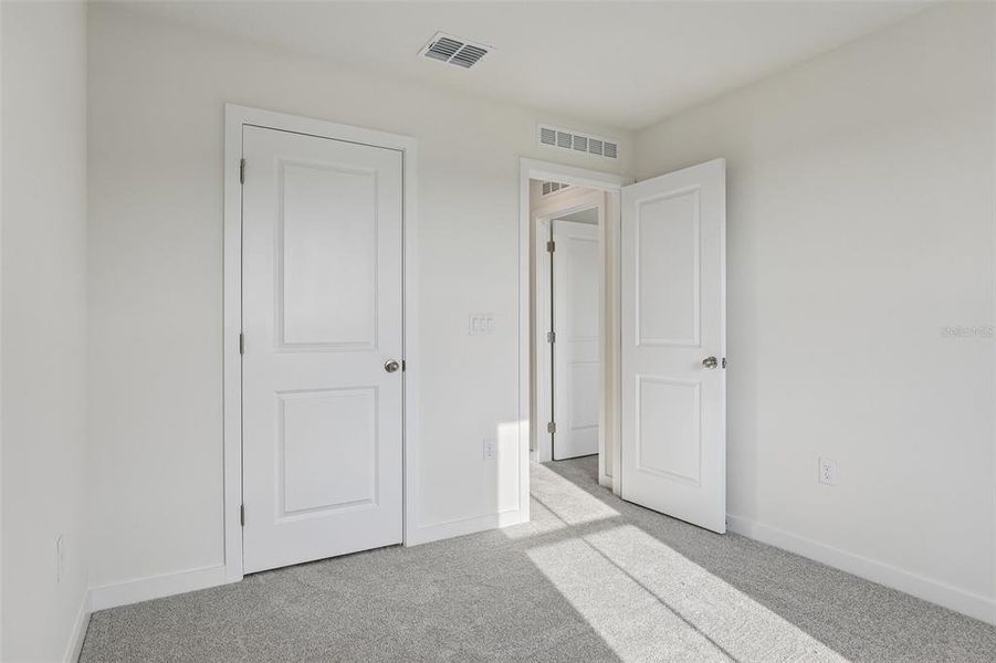 Spacious, unfurnished interior of a new home in Cyrene at Harmony, St. Cloud (Image 31). Spacious, unfurnished interior of a new home in Cyrene at Harmony, St. Cloud (Image 31).