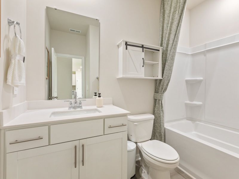 Secondary bathroom in the Chatham floorplan at a Meritage Homes community in Angier, NC.