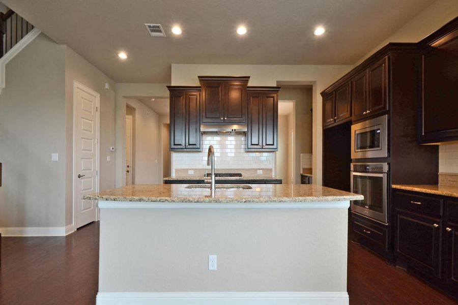 Representative furnished interior of a home built from the Oaks 3646 by Brohn Homes in Oaks at San Gabriel, Georgetown (Image 3).