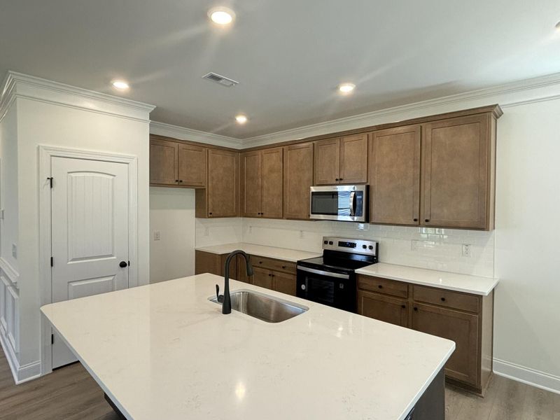 Furnished interior view inside a new home in Daniel Farms, Benson (Image 5).