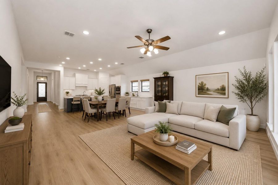 *VIRTUALLY STAGED* Spacious open living room area connected to the kitchen
