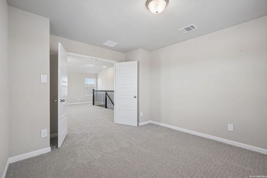 Spacious, unfurnished interior of a new home in Remington Ranch, San Antonio (Image 29).