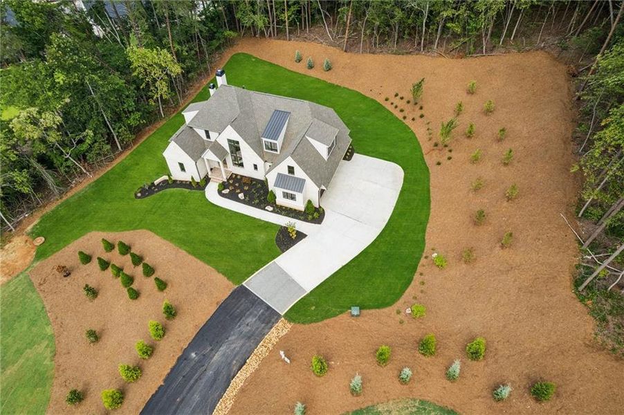 Front exterior of a new home in , Cumming, GA, highlighting curb appeal (Image 28).