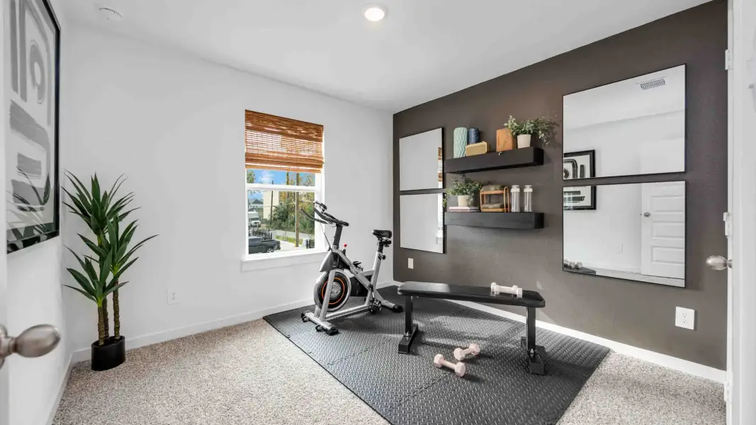 Representative furnished interior of a home built from the Iris by D.R. Horton in Palmi, Houston (Image 13).