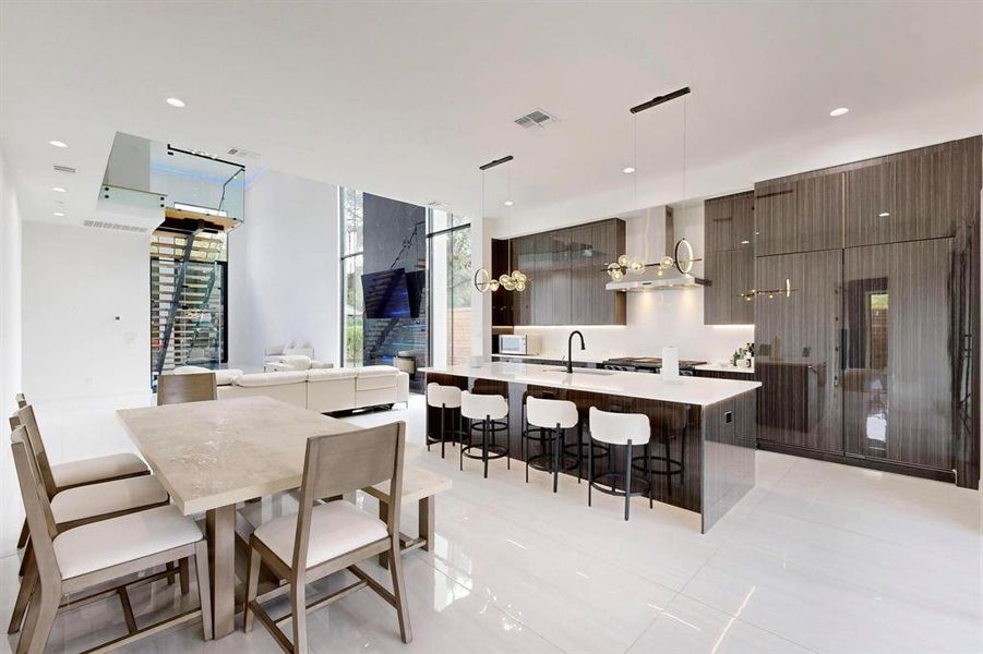 Dining room featuring light tile patterned floors and recessed lighting Dining room featuring light tile patterned floors and recessed lighting