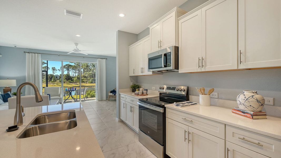Furnished interior view inside a new home in Grand Park Real Estate and Homes for Sale in Sarasota, FL - Neal Communities, Sarasota (Image 16).