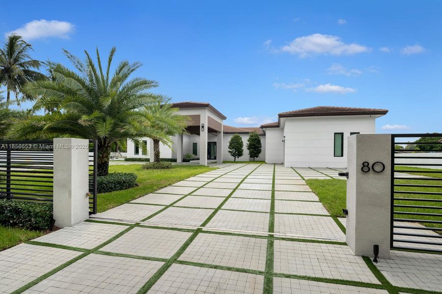 Front exterior of a new home in , Miami, FL, highlighting curb appeal (Image 19).