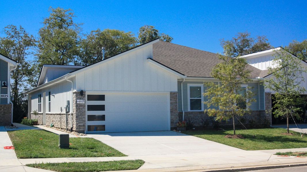Front exterior of a new home in Nexus South, Gallatin, TN, highlighting curb appeal (Image 23). Front exterior of a new home in Nexus South, Gallatin, TN, highlighting curb appeal (Image 23).