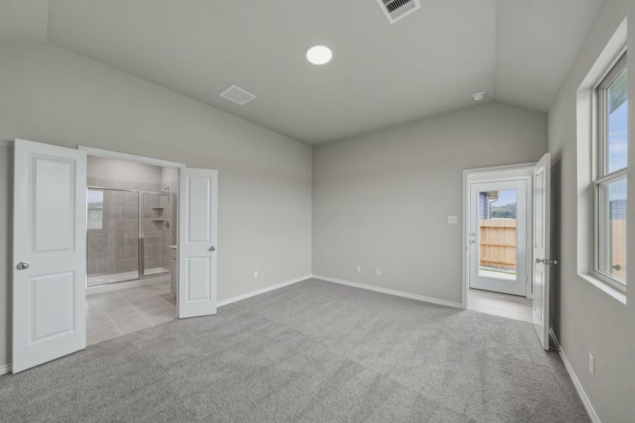 Primary Bedroom in the Cedar home plan by Trophy Signature Homes – REPRESENTATIVE PHOTO Primary Bedroom in the Cedar home plan by Trophy Signature Homes – REPRESENTATIVE PHOTO