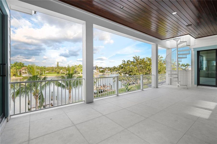 Custom Aluminum Spiral Staircase Beckons you to the Rooftop Terrace