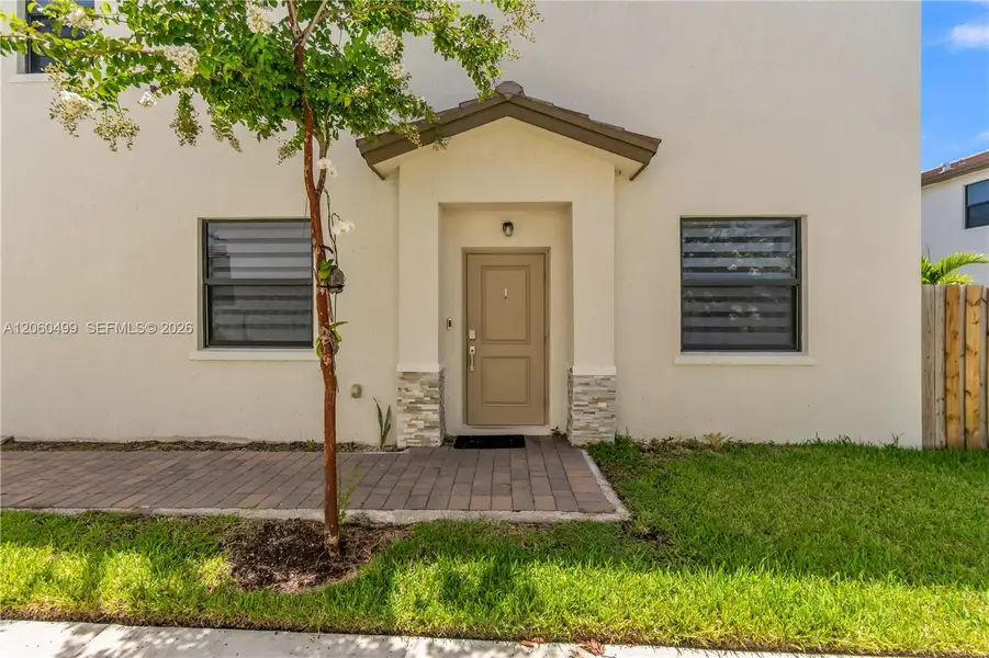 Exterior details and patio area of a home in , Miami (Image 3).