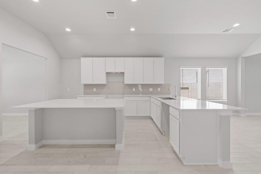 Furnished interior view inside a new home in Sunterra North, Katy (Image 7).