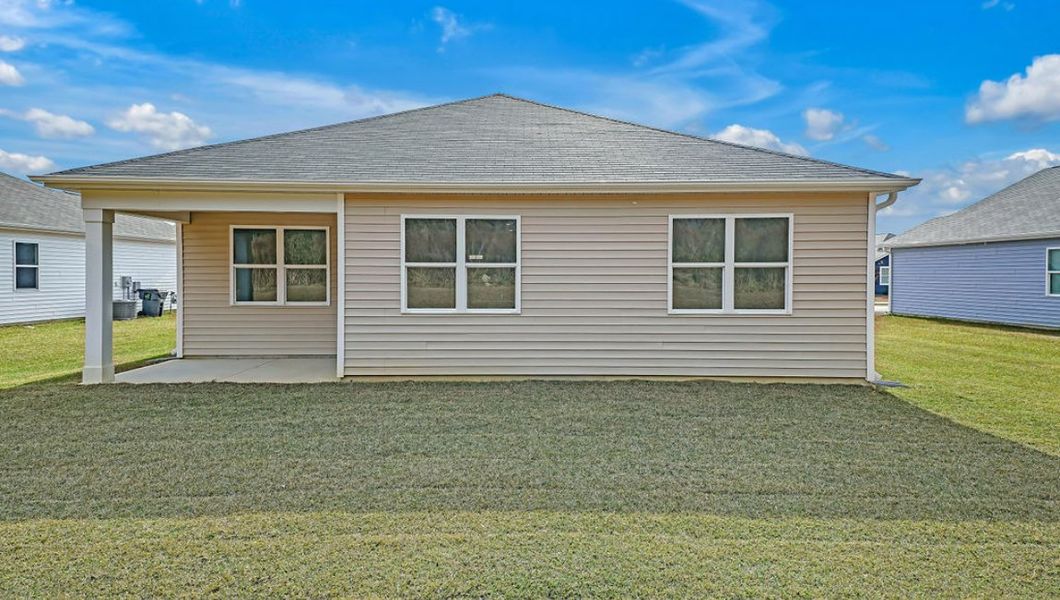 Representative exterior photo of a completed home built from the ARIA by D.R. Horton in Bella Point, Bolivia, NC (Image 18).