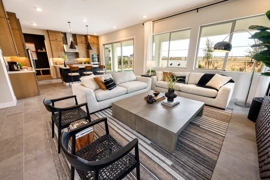 Representative furnished interior of a home built from the Willow Plan 40-9 by Tri Pointe Homes in Waterston Central, Gilbert (Image 11).